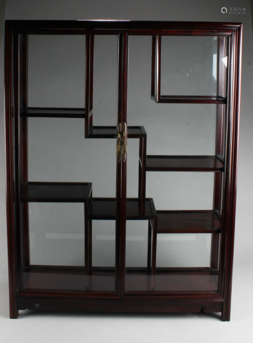 A Hardwood Display Cabinet with Glass Panels