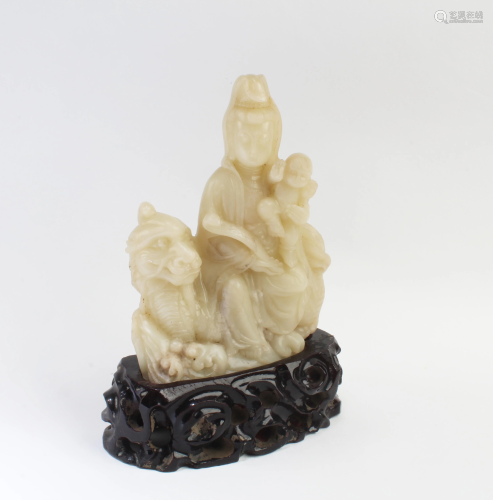 A Carved Soapstone Figurine