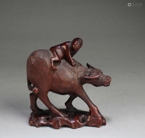 A Carved Wooden Water Buffalo Figurine