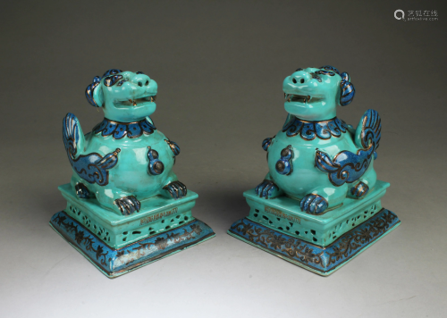 A Pair of Porcelain Mythical Beast Figurines