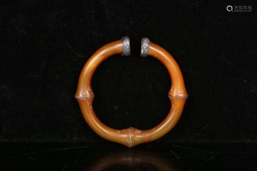 An Agate Bangle With Silver