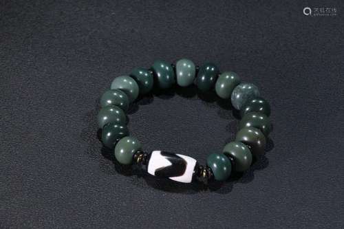 An Agate Bracelet With Dzi