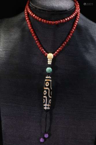 A Nine-Eye Dzi Necklace