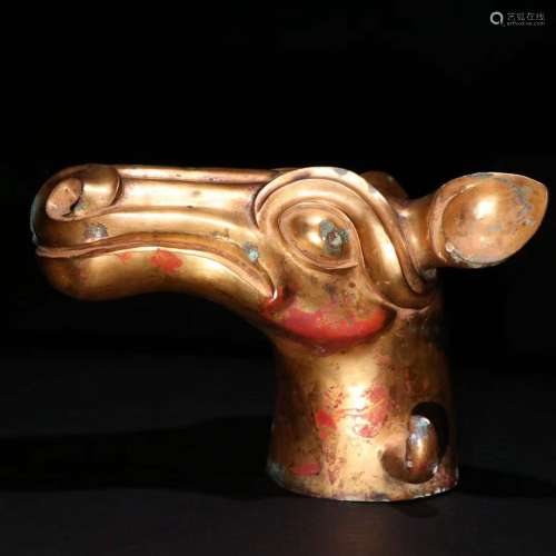 A Gilt Bronze Beast Head Ornament