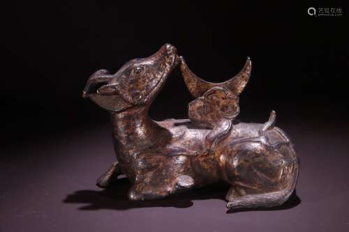 A Bronze Deer Shaped Ornament With Gold Painting