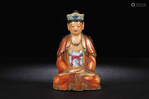 A Porcelain Famille Rose Guanyin Statue