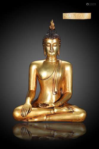 A Gilt Bronze Gautama Buddha Sitting Statue