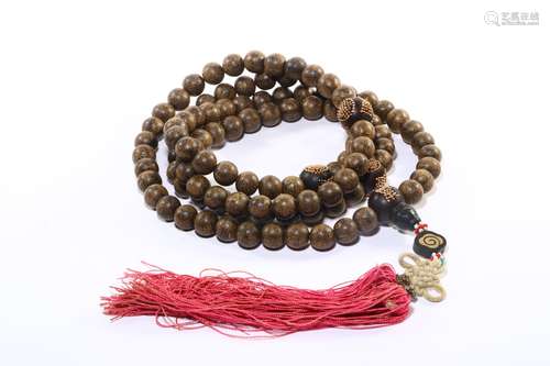 An Agarwood Rosary With Gilding