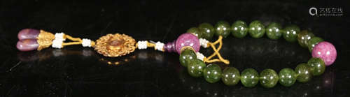 TOURMALINE STRING BRACELET WITH 18 BEADS