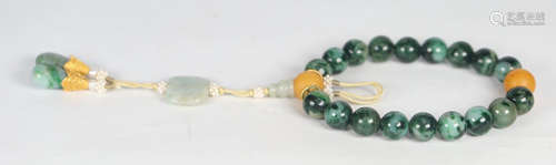 JADEITE STRING BRACELET WITH 18 BEADS