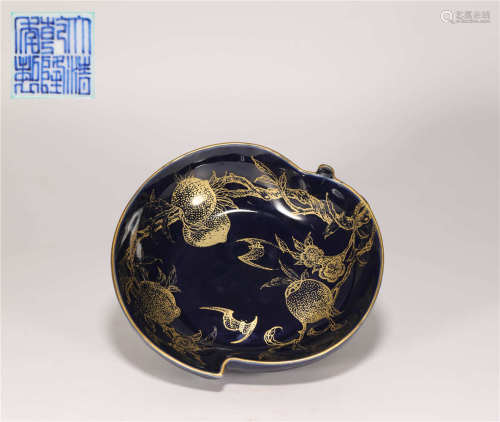 Blue bottom and gold tracing peach shape plate from Qing清代藍底描金桃形盤