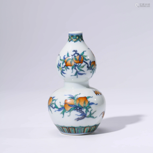 A CHINESE DOUCAI PORCELAIN PEACHES DOUBLE-GOUR…