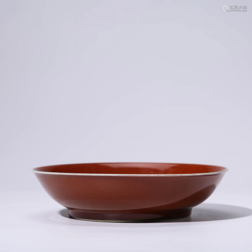 A CHINESE RED-GLAZED PORCELAIN DISH MARKED QIAN LO…