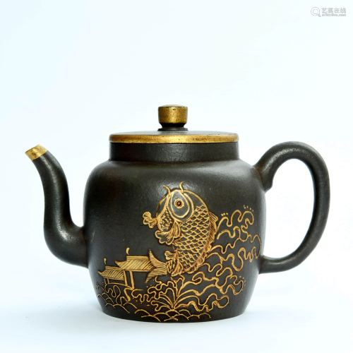 A CHINESE REDWARE TEAPOT