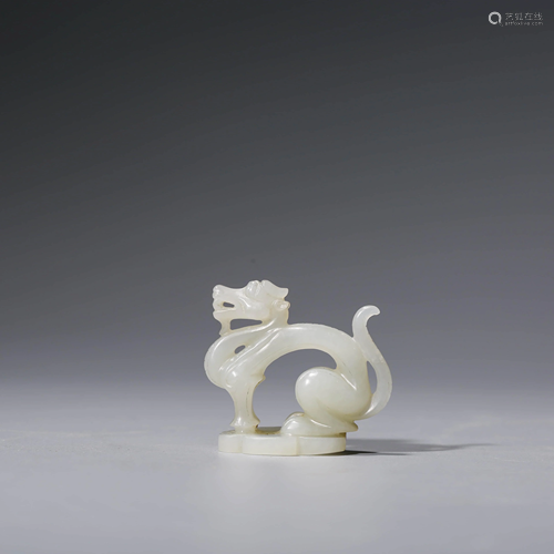 A CHINESE WHITE JADE ORNAMENT