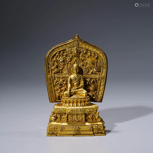 A CHINESE GILT-BRONZE SAKYAMUNI STATUE