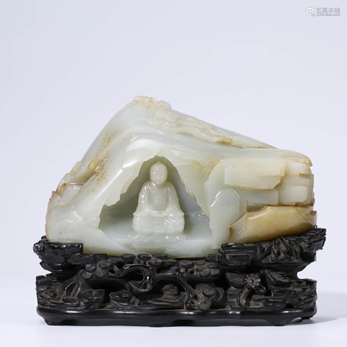 A CHINESE WHITE JADE CARVING OF A MOUNTAIN & BUDD…