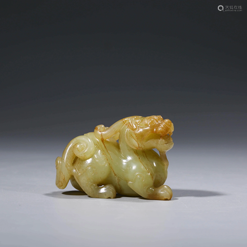 A CHINESE YELLOW JADE ANIMAL