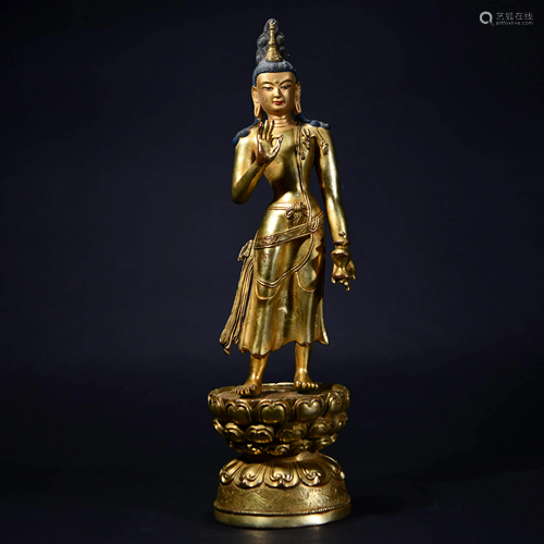 A CHINESE GILT-BRONZE AVALOKITESHVARA STATUE