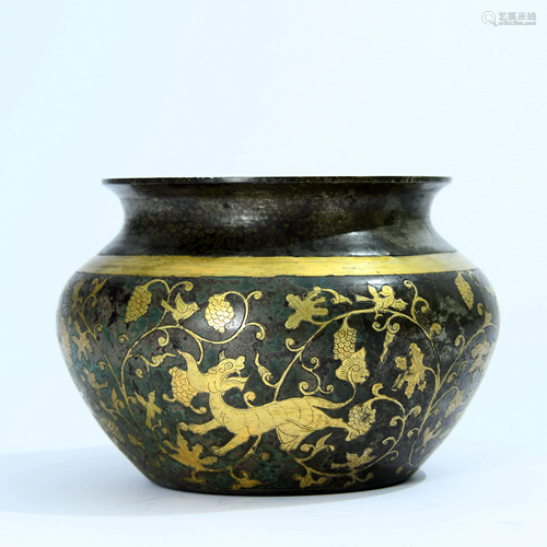 A CHINESE GOLD-DECORATED SILVER JAR