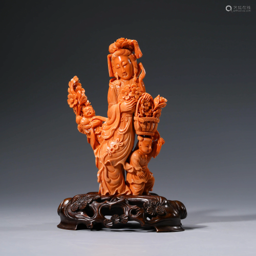 A CHINESE CORAL CARVING OF A LADY & CHILD WITH STAND