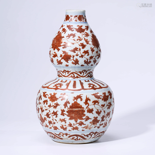 A CHINESE IRON-RED PORCELAIN INTERLOCK BRANCH D…