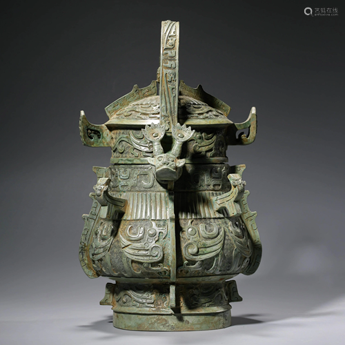 A CHINESE BRONZE WINE VESSEL