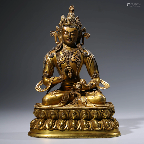 A CHINESE GILT-BRONZE VAJARDHAR STATUE