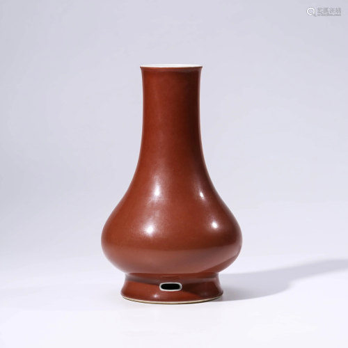 A CHINESE RED-GLAZED PORCELAIN VASE MARKED QIAN LO…