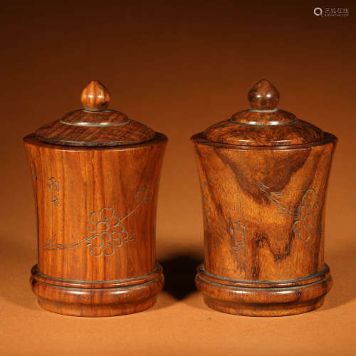 A Pair of Plum Blossom Carved Rosewood Jars and Covers