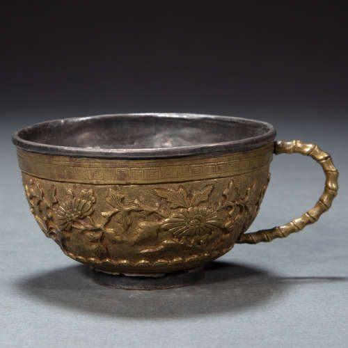 AN  CHINESE SILVER GILT CUP