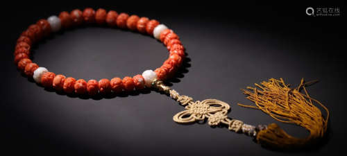 CORAL STRING BRACELET WITH 36 BEADS