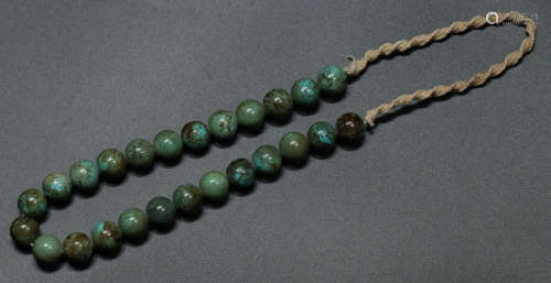 TURQUOISE STRING BRACELET WITH 25 BEADS