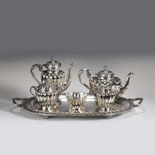 A SET OF SILVERWARE TEA SETS