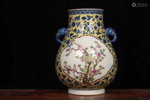 QING DYNASTY QIANLONG PERIOD--YELLOW GROUND BLUE WHITE FOLIAGE AND FAMILLE ROSE BIRD FLOWER DOUBLE-EARED VASE