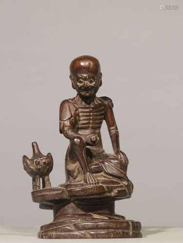 ZITAN WOOD CARVED 'ARHAT' SEATED FIGURE