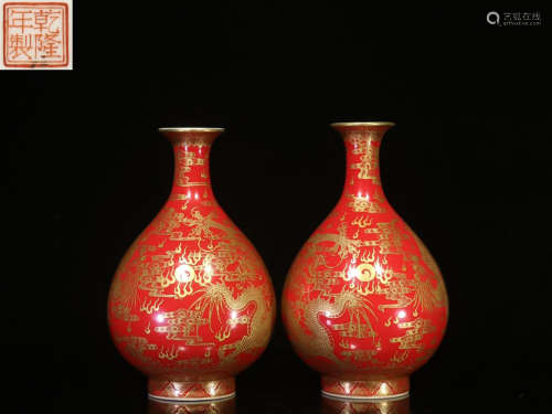 PAIR OF RED GROUND AND GILT 'DRAGONS' VASES