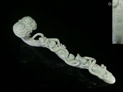 CELADON GLAZED AND CARVED 'PEACHES' RUYI SCEPTER