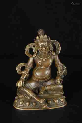 A CHINESE BRONZE YELLOW JAMBHALA STATUE