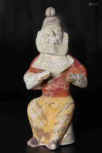 A CHINESE POTTERY FIGURINE, TANG DYNASTY