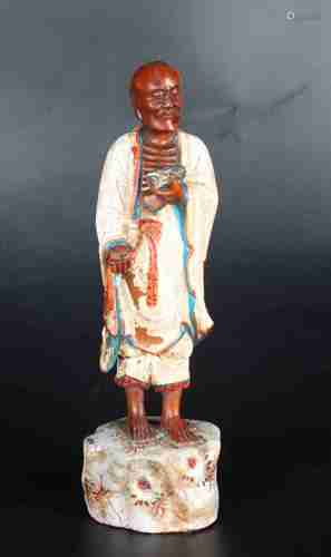 A CHINESE BOXWOOD ARHAT STATUE PAINTED WITH COLOR, QING DYNASTY