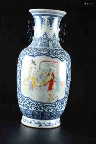 A CHINESE BIG BLUE AND WHITE FAMILLE ROSE VASE