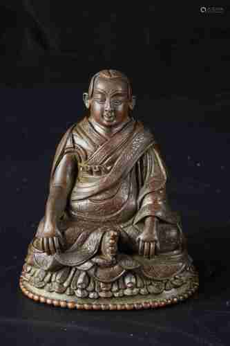 A CHINESE BRONZE DALAI LAMA STATUE, MING DYNASTY