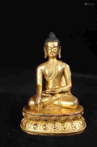 A CHINESE GILT BRONZE SAKYAMUNI STATUE IN THE 18TH CENTURY