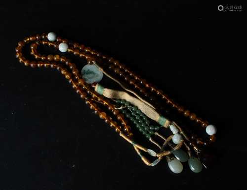 A CHINESE AMBER COURT BEADS, QING DYNASTY