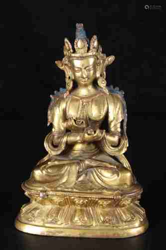 A CHINESE GILT BRONZE GUANYIN STATUE