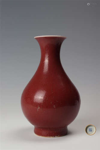 红釉橄榄瓶 A copper red glazed vase