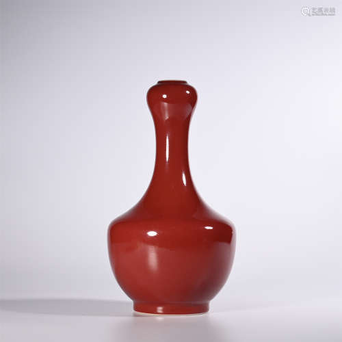 Qing Dynasty Qianlong red glaze garlic bottle