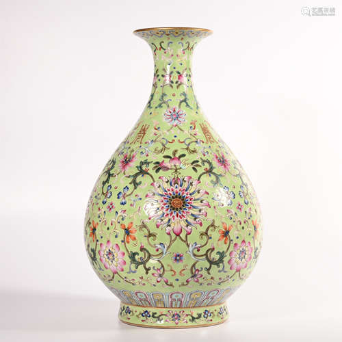 Qing Dynasty Qianlong pink vase with lotus pattern