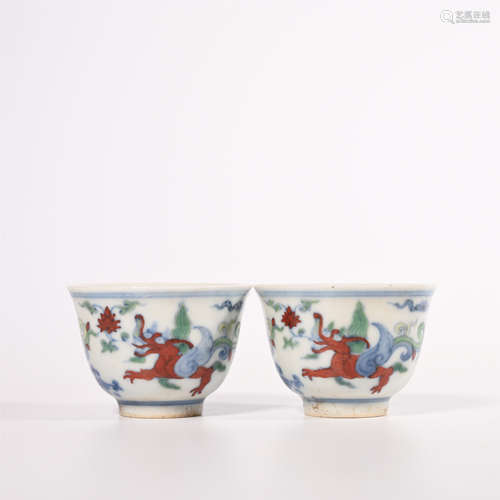 A pair of pink dragon shaped cups in Ming Dynasty